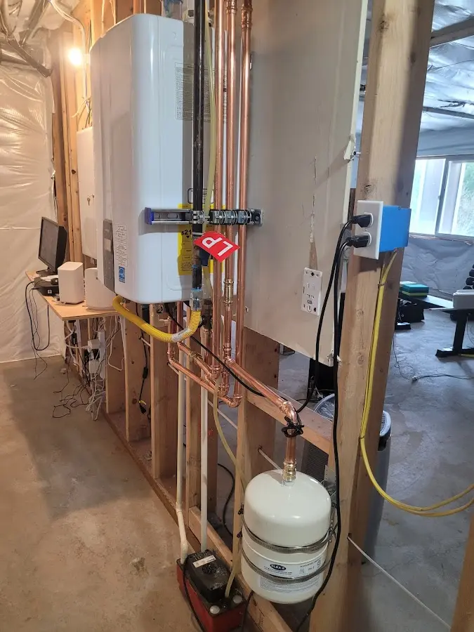 Licensed plumber repairing a kitchen sink in La Grange